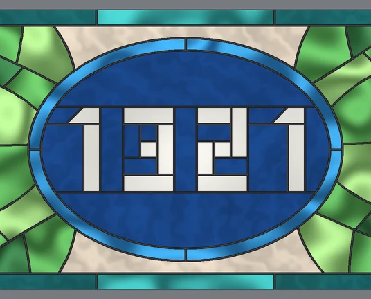 Close-up of white glass digits on a navy glass oval inside a monstera transom